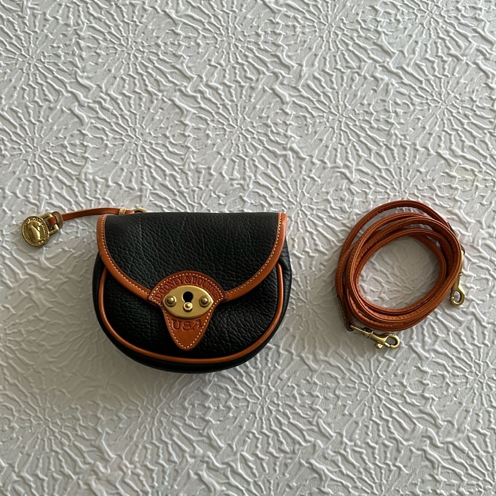 Dooney & Bourke classic all weather leather belt bag w/ convertible cross body.